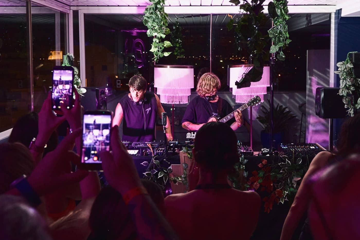 Twin Paradox playing to the floor at Ocean Drive, phones raised