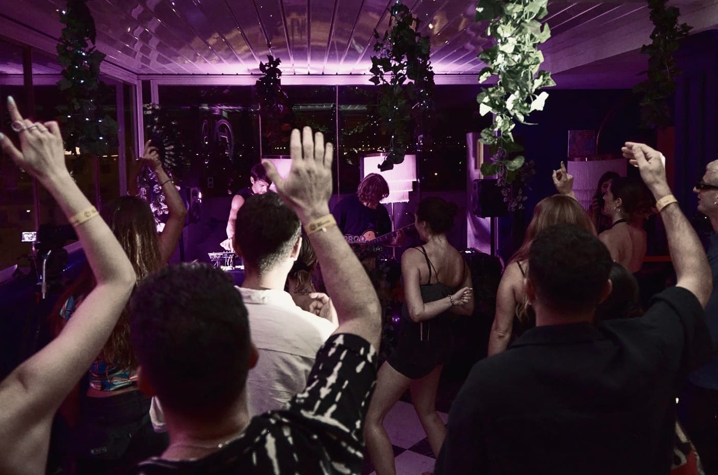 The dance floor mid-set, hands in the air